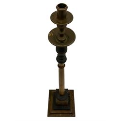 Pair of beech and ebonised wood candle stands, brass fittings