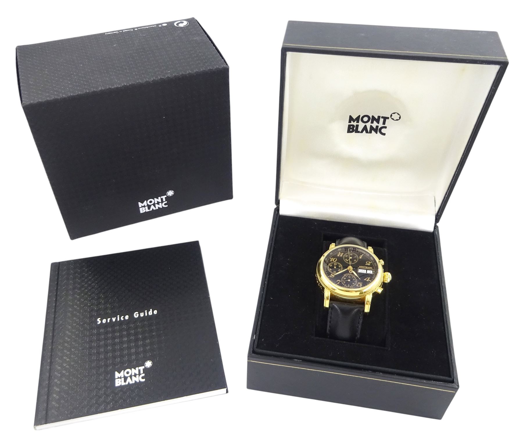 Montblanc Meisterstück gentleman's automatic chronograph gold-plated wristwatch, Ref. 7016. Cal. 4810 501, black dial with Arabic hour markers, dials at 6, 9 and 12 for seconds, 30 minute and 12 hour recording, day / date aperture, on original black leather strap, with gilt Montblanc buckle, boxed with warranty dated 1999