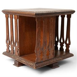 Early 20th century tabletop oak revolving bookcase, of square section upon short platform base 