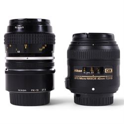 Two Micro-Nikkor camera lenses, comprising AF-S DX 40mm 1:2.8G with user manual, serial no. 2055767 and a 55mm 1:3.5 serial no. 1051782