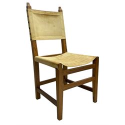 Hedgehogman - set of seven (5+2) safari design dining chairs, with leather slung back and seats, raised on square tapering supports united by stretchers, carved with hedgehog signature to outer stretcher, by Nick Hill, Brompton