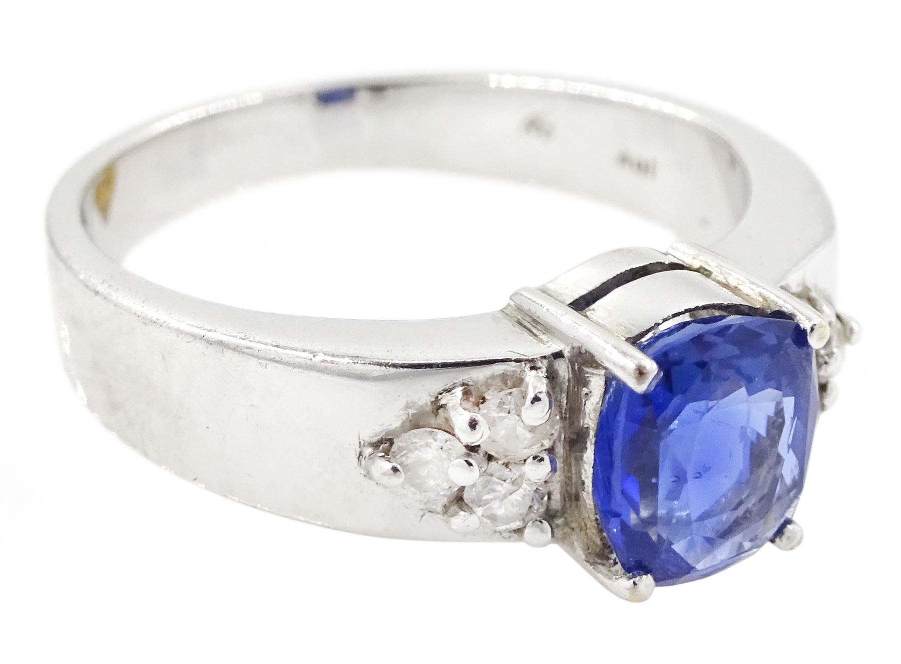 18ct white gold sapphire and diamond ring, cushion cut sapphire of approx 1.00 carat, with three round brilliant cut diamonds set either side, total diamond weight approx 0.10 carat