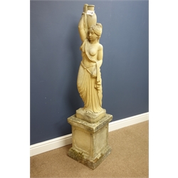 'Selby stone' composite stone figure of a semi-nude woman carrying jug aloft, on stepped square plinth, H146cm  