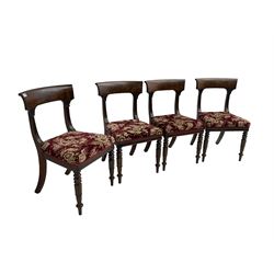 Set four William IV mahogany dining chairs, shaped and rolled cresting rail on moulded and carved uprights, upholstered in floral patterned fabric, on turned front supports