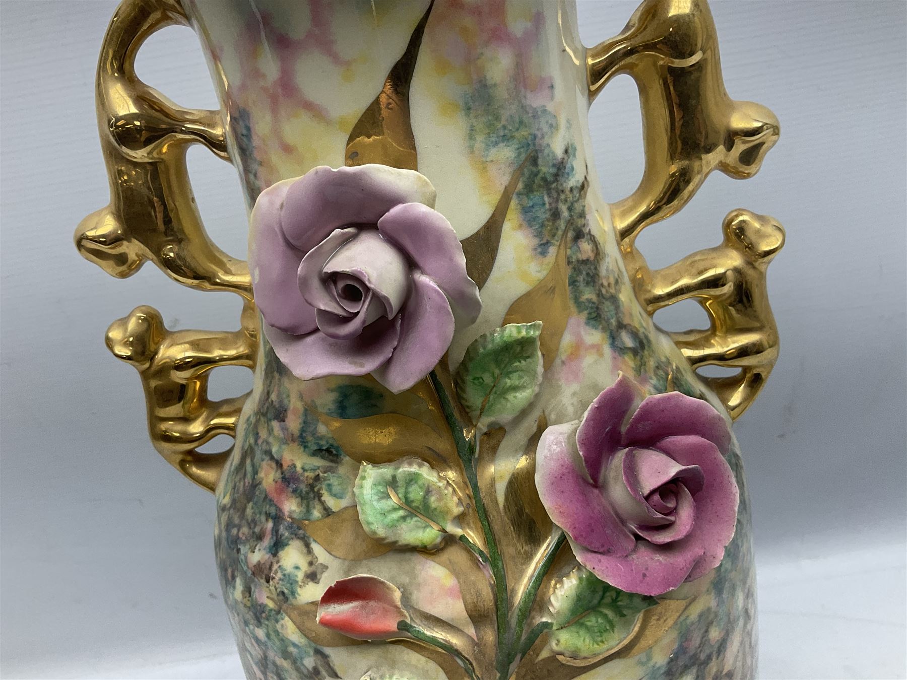 Mid-late 20th century French vase of baluster form by M. Depose, with applied floral decoration and gilding, and twin handles, with impressed mark beneath, H55cm