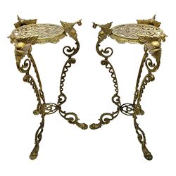 Pair of brass jardinière stands, decorated with the legs decorated with demon masks, pierced detail and claw feet, H57cm   