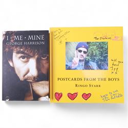 The Beatles memorabilia, including 1964 Fan Club patch, framed with a black and white picture of the band, a further framed black and white picture displayed with Strawberry Fields Forever single, The Beatles Anthology, biographies and other books, two CDs, mug, etc