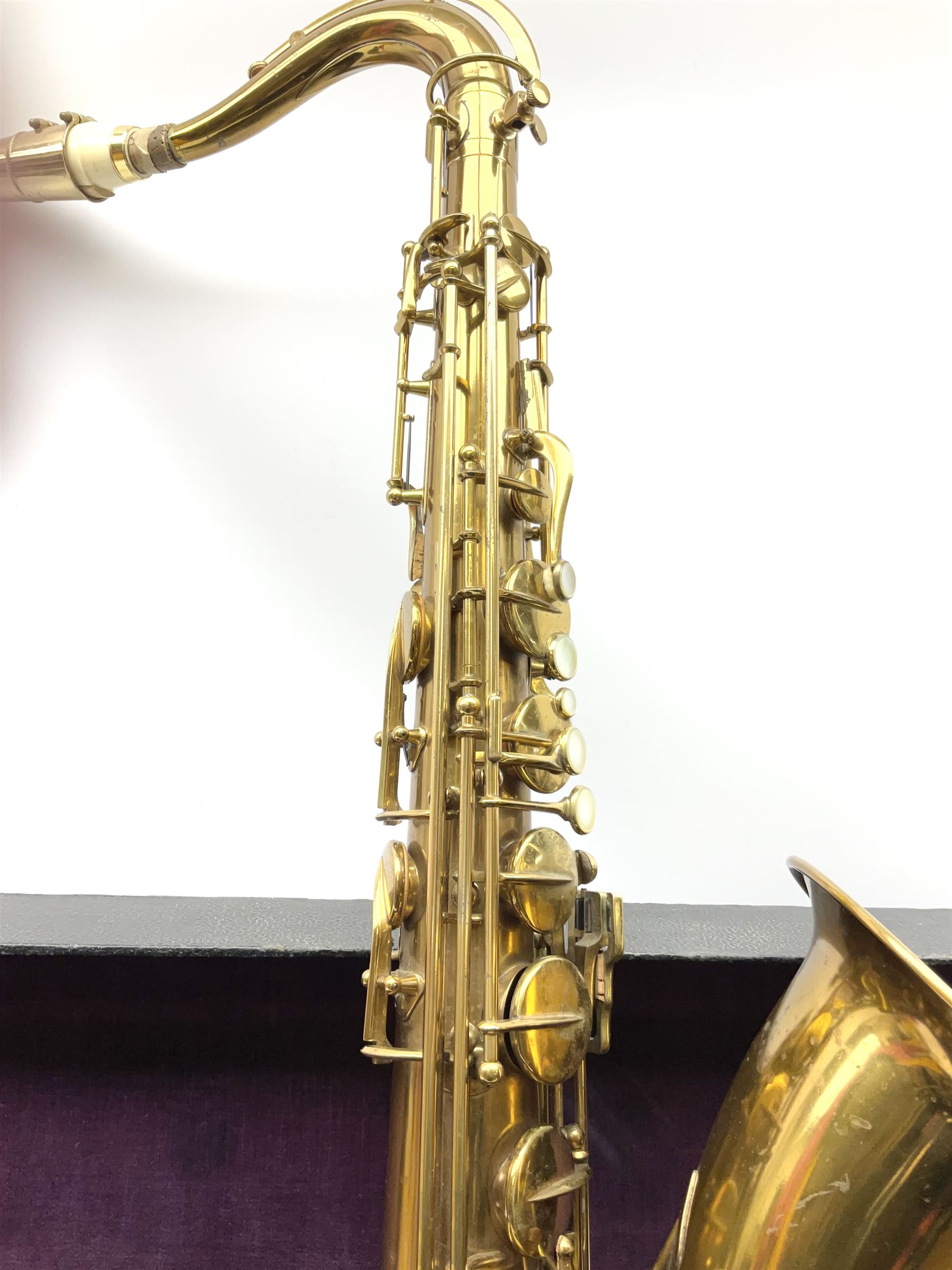Brass tenor saxophone by Adolphe SAX, 84 Rue Myrha, Paris,  No.938 serial number 12097, H75cm excluding crook; in hard carrying case bearing plaque for Henri Selmer