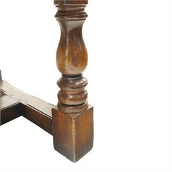 17th century design 8ft dark oak refectory dining table, the rectangular top raised on four turned baluster supports united by H-stretcher