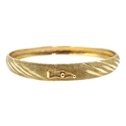  Two gold bangles, stamped 10K, approx 7.6gm  