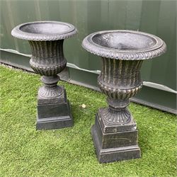 Pair of medium cast iron bronze finish garden urns, egg and dart rim, pedestal base
 - THIS LOT IS TO BE COLLECTED BY APPOINTMENT FROM DUGGLEBY STORAGE, GREAT HILL, EASTFIELD, SCARBOROUGH, YO11 3TX