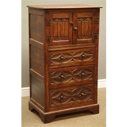 17th century style oak side cabinet, two linen fold carved doors above  three leaf carved drawers on  bracket feet, W68cm, D49cm, H120cm  