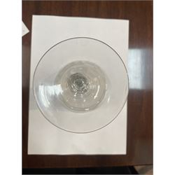 Dutch engraved Newcastle light baluster glass, circa 1760, the funnel bowl engraved with a two storey country house and church flanked by trees, beneath the inscription ‘T WELVAREN VAN LANDT ENKERK’ (The prosperity of the Country and Church), upon a multi knopped stem with beaded knop and basal knop, over conical foot, H18cm



