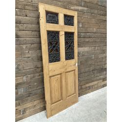 Early 20th century pine six panel door with later stained glass panels