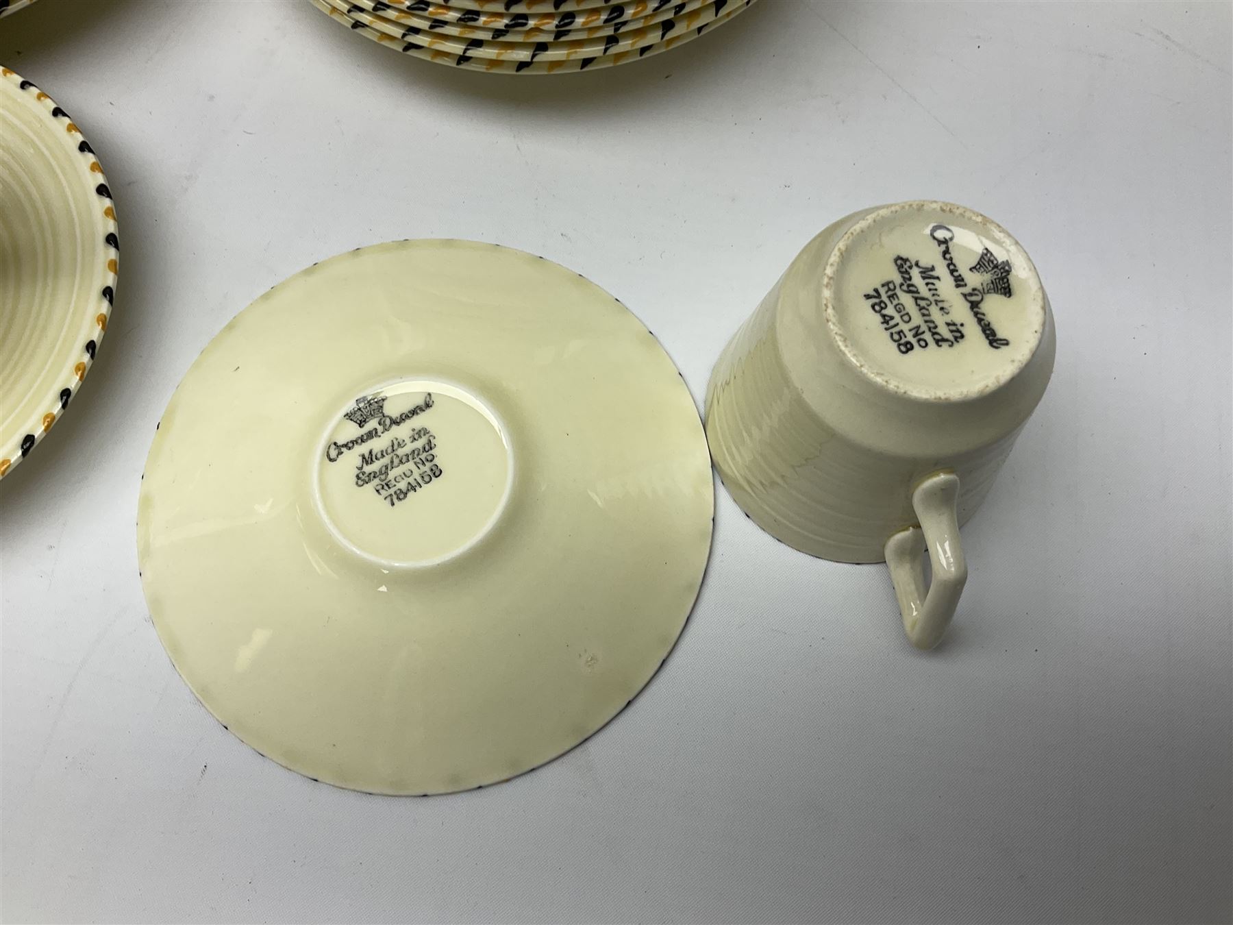 Art Deco Crown Ducal tea and dinner wares, reg no. 784158, comprising dinner plates, teacups, saucers, coffee cups, crescent shaped side plates, bowls, eggcups, etc, (93)