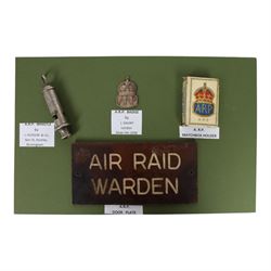 Air Raid Precautions items, including four door plates, silver lapel bedges, Women's Voluntary Service, whistle, matchbox etc  