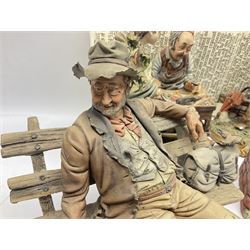 Four Capodimonte figure groups, to include tramp figures, shoemaker figure etc