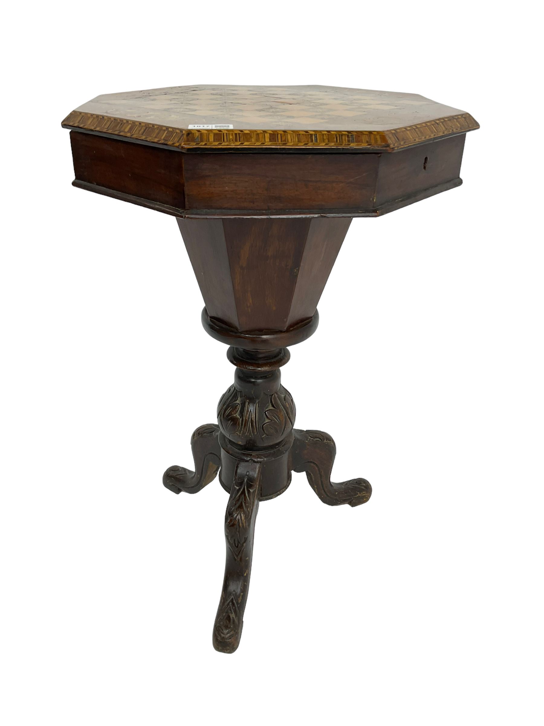 Late 19th century inlaid walnut sewing or work table, octagonal hinged top with satinwood and ebony chessboard inlay, surrounded by foliate decoration, the edges inlaid with crossbanding and stringing, fitted interior with chess pieces, raised on baluster pedestal carved with acanthus leaves on a tripod base 