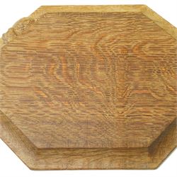 Mouseman - oak chopping board, of canted octagonal form, with carved mouse signature, by the workshop of Robert Thompson of Kilburn