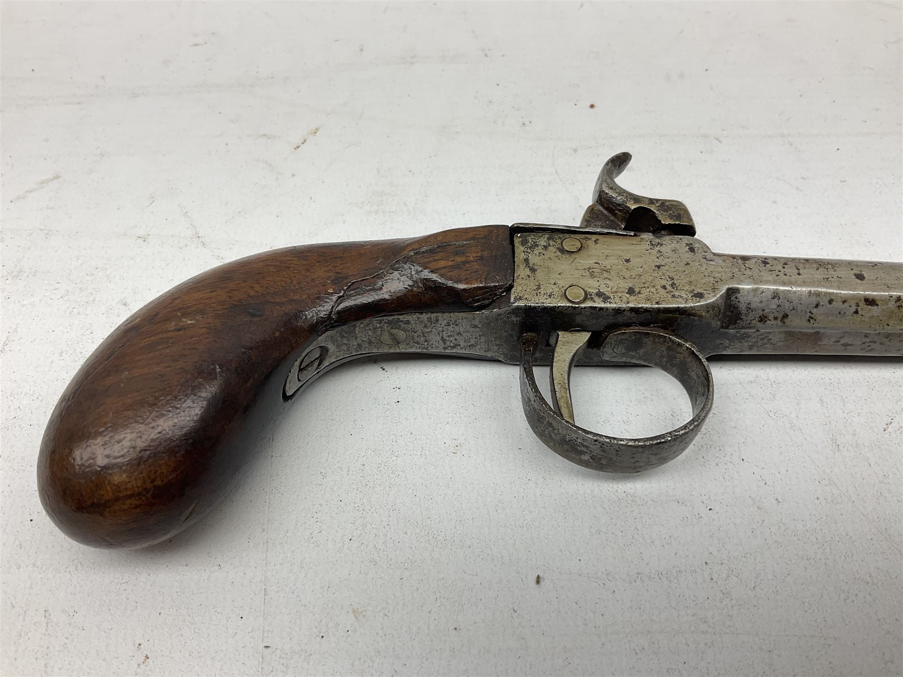 Mid 19th century double barrel percussion muff pistol, joined 7cm octagonal barrels with walnut stock19cm overall; a matching single barrel muff pistol 17cm overall (2)