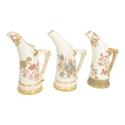 Four Royal Worcester tusk jugs of curved cylindrical form, the handle in the form of a gilded deer's antler, all decorated with floral sprigs, with puce marks beneath and numbered 1116, largest H29cm