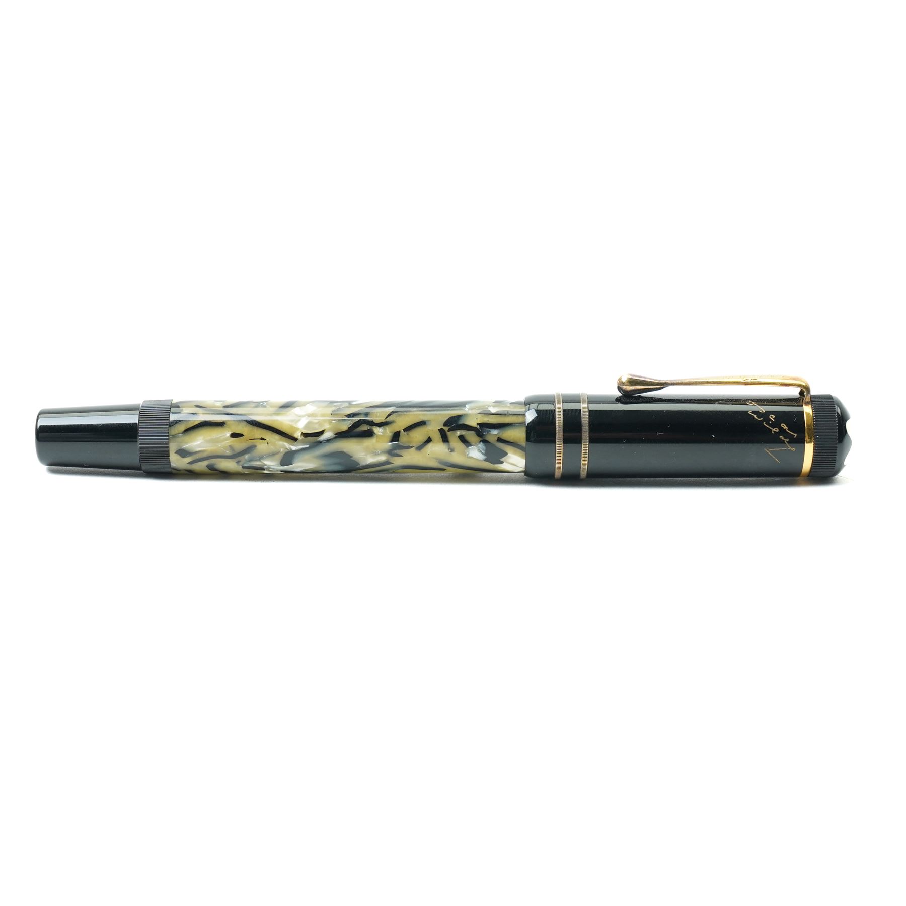 Montblanc Meisterstück Oscar Wilde limited edition fountain pen, black resin cap and barrel with marbled ivory and black patterned lower barrel and gold-plated fittings, the cap signed with Oscar Wilde facsimile and surmounted by the white star emblem, fitted with a medium 18K (750) gold nib engraved 4810, 1994 and MONTBLANC, model no. 28616, presented in original lined fitted case in the form of a book with outer box
