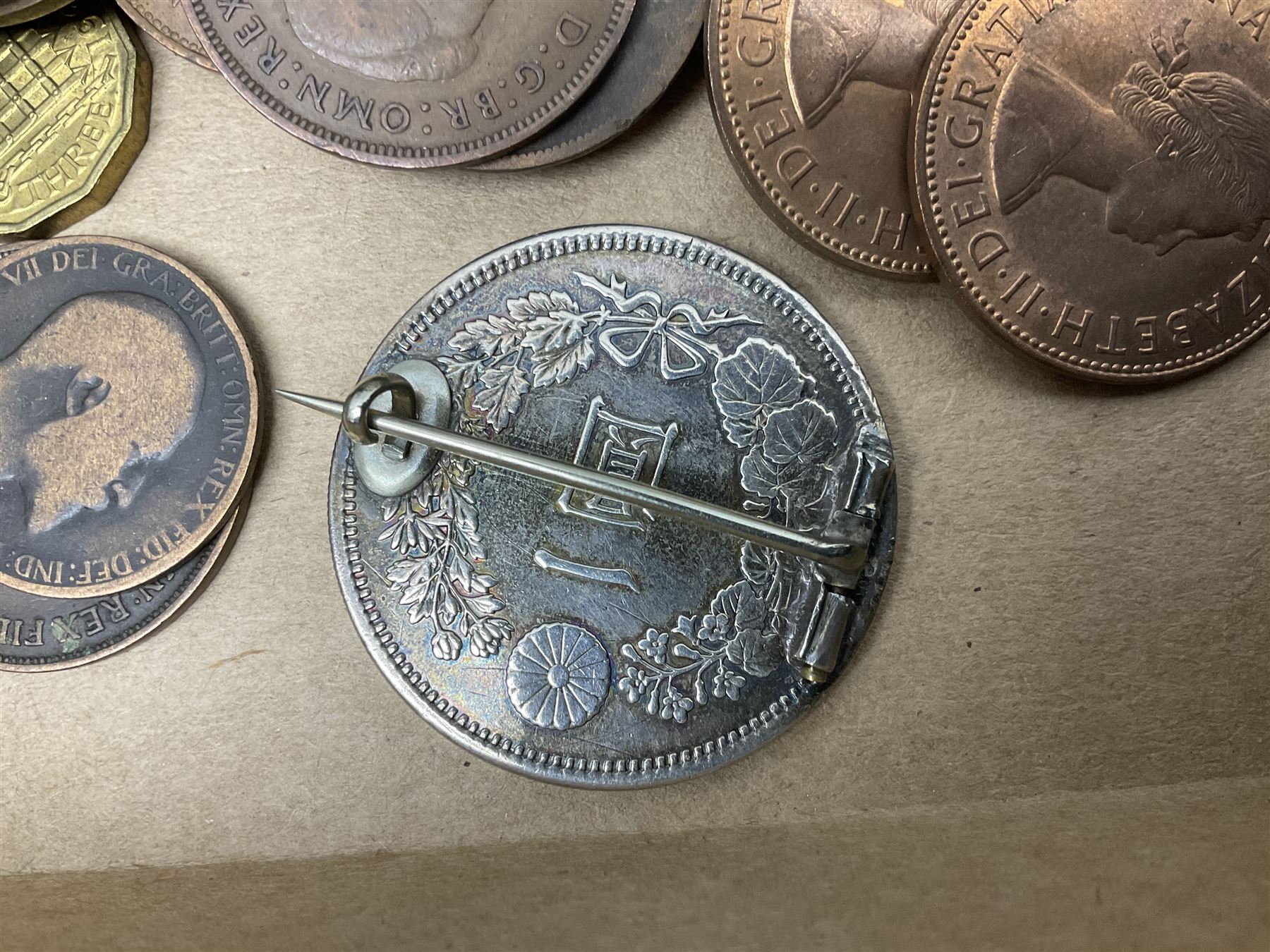 Great British and World coins and banknotes, including pre-decimal coinage, Britain's first decimal coins sets in blue folders, silver one yen coin converted into a brooch, commemorative crowns etc