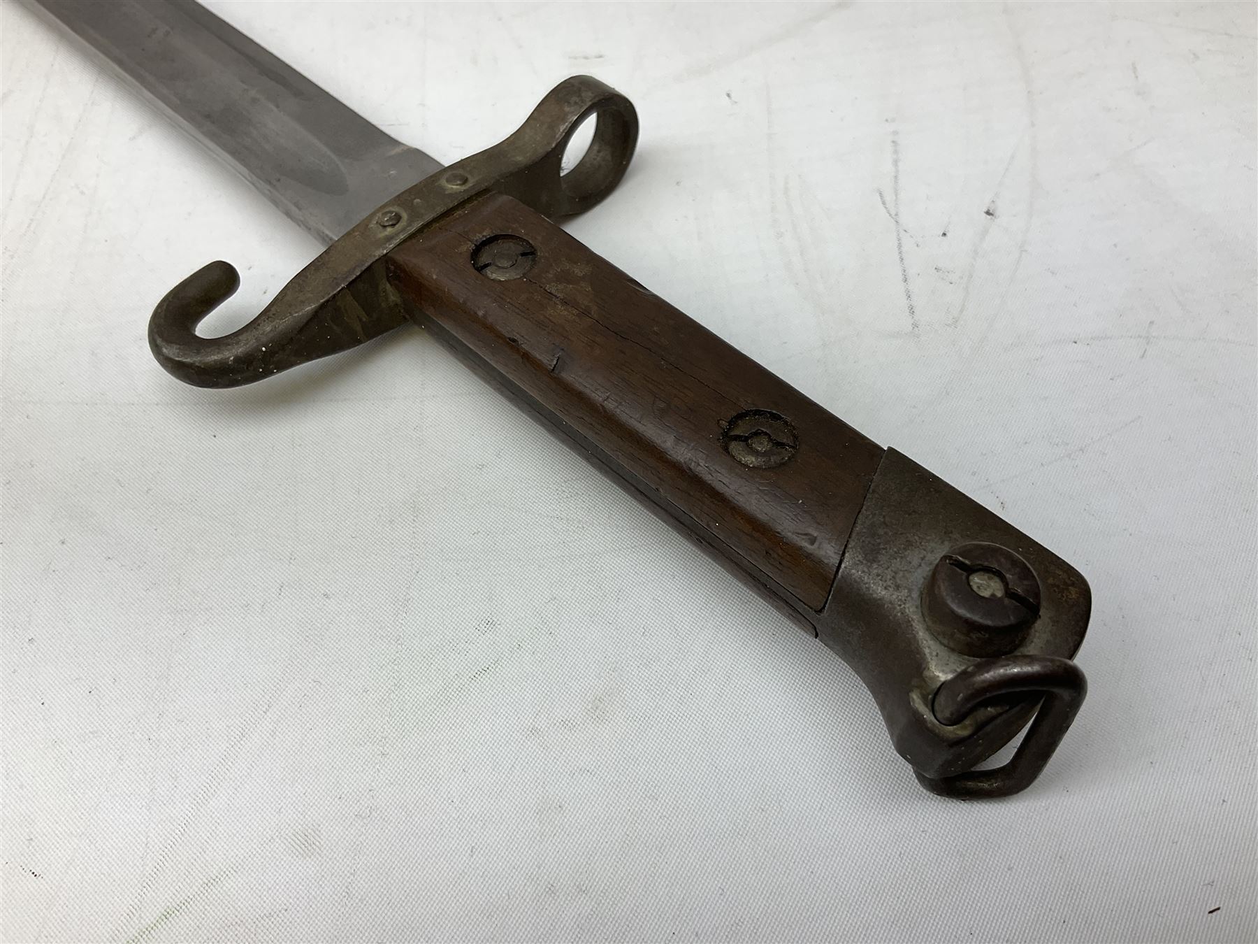 Austrian Model 1895 carbine NCO's knife bayonet with 25cm fullered steel blade; in steel scabbard with webbing frog L39cm overall; and Spanish Model 1941 Bolo bayonet with 25cm fullered steel blade No.6412D; in steel scabbard (2)