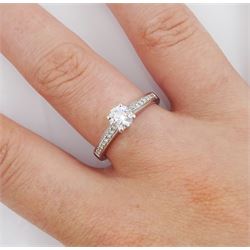 18ct white gold single stone round brilliant cut diamond ring, with diamond set shoulders, stamped 750, principal diamond 0.53 carat, diamond colour D, clarity VVS2, with GIA report