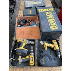 Three DeWalt battery drills, two heat guns and four DeWalt cases  - THIS LOT IS TO BE COLLECTED BY APPOINTMENT FROM DUGGLEBY STORAGE, GREAT HILL, EASTFIELD, SCARBOROUGH, YO11 3TX