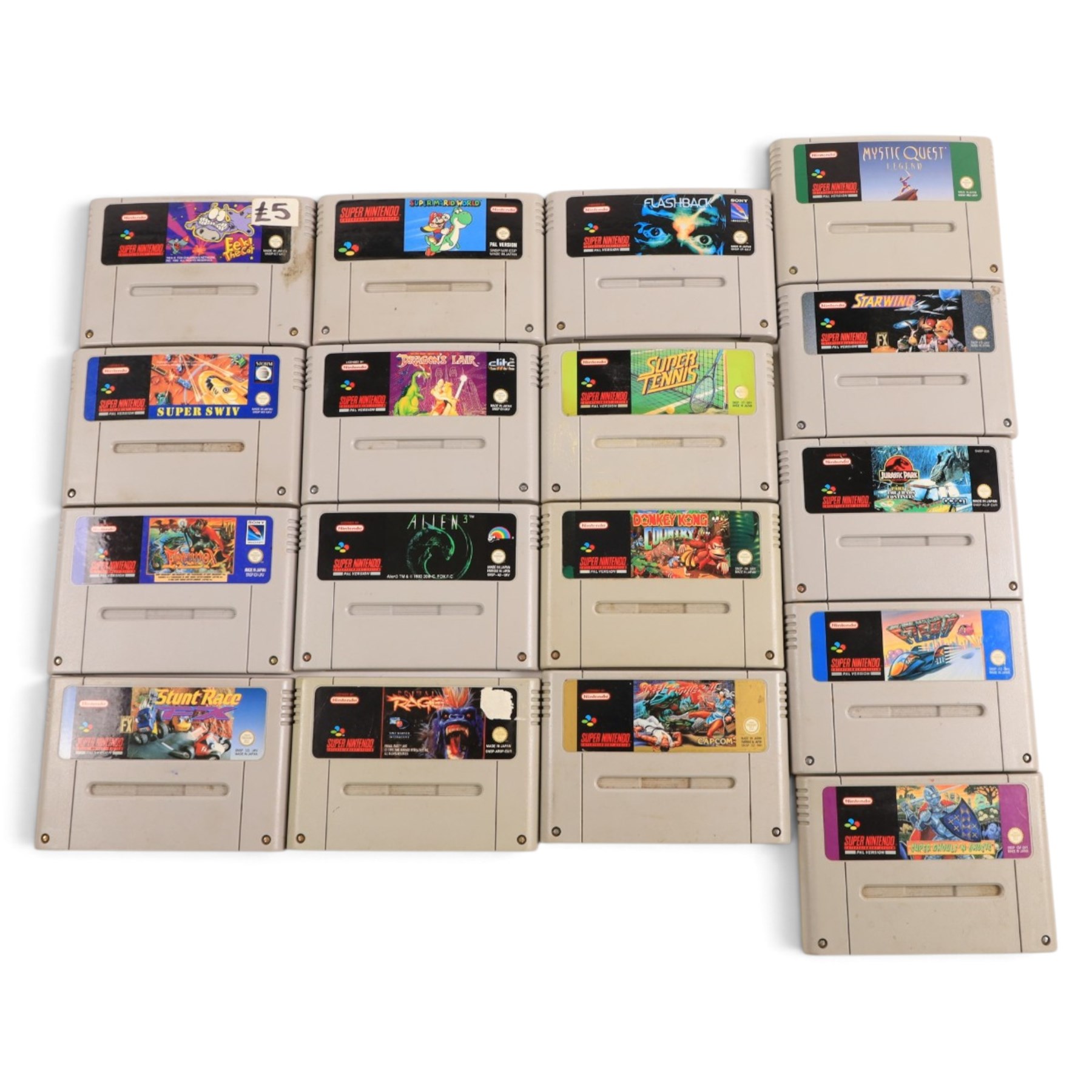 Super Nintendo Entertainment System console, three controllers including a Sprint Pad, a Nintendo Game Cube controller and a collection of SNES games, comprising Mystic Quest Legend, Flashback, Super Swiv, Eek The Cat, Street Fighter II, Dragons Lair, Jurassic Park Part II, Equinox, Donkey Kong Country, Super Mario World, Stunt Race, Super Tennis, Primal Rage, Alien 3, Starwing and F-Zero, all unboxed 