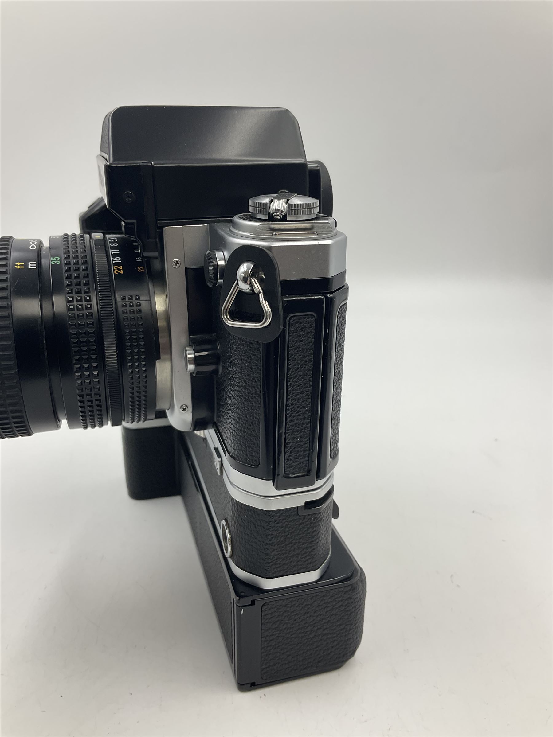 Nikon F2A Photomic camera body, serial no. 7844439, with 'Nikon Zoom-NIKKOR 35-70mm 1:3.5-4.8' lens, serial no. 5352031, Nikon MD1 Motor Drive, serial no. 208608 and Nikon MB1 battery pack