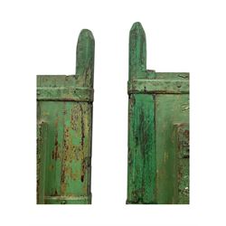 Pair of green-painted Indian doors, c.1860–1880, made from solid teak featuring original iron work and hand-painted finish