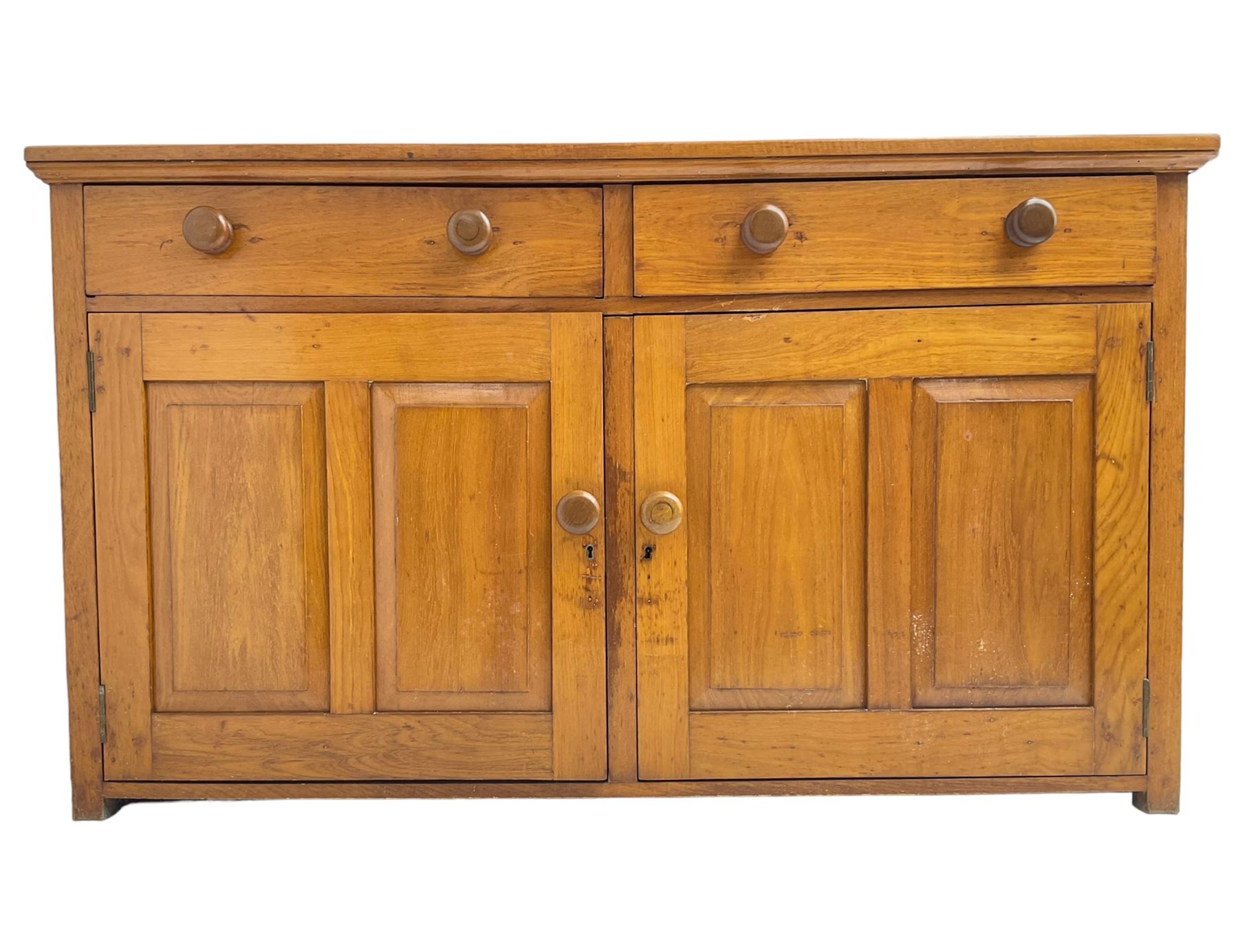 JAS Brister & Co Ld - Mid-20th century teak sideboard, fitted with two drawers over two panelled cupboards, stamped 'JAS. Brister & Co Ltd., Complete House Furniture, Port Elizabeth'