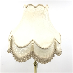 Brass standard lamp, three splayed supports, H143cm