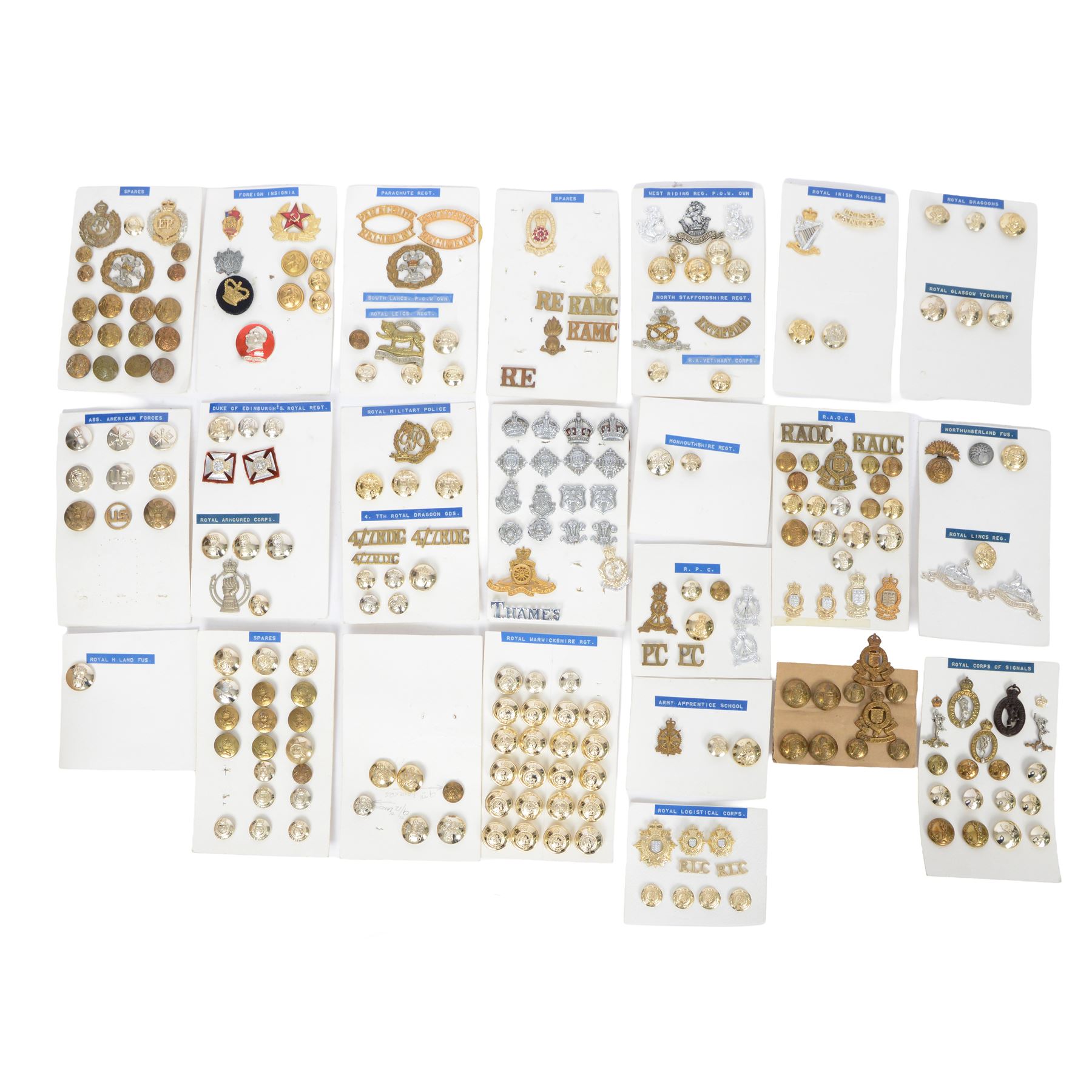 Collection of military cap badges, buttons and similar, including examples for Royal Corps of Signals, Royal Irish Rangers, Duke of Edinburgh Royal Regiment etc  