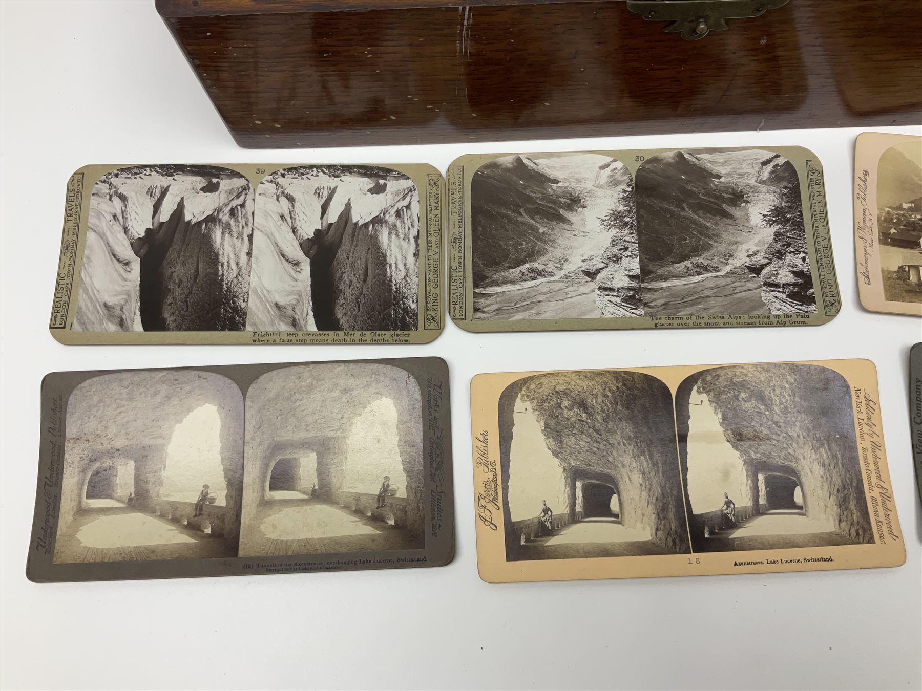 Underwood & Underwood sun sculpture stereoscope viewer, together with three other stereoscope viewer, and box of stereoscopic views by Realistic Travels 