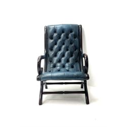 Deep buttoned Library Chair, scrolling arms, upholstered in a deep blue leather