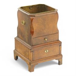 George III figured walnut champagne or wine cooler, of stepped square form with ogee cut-outs, fitted with two drawers, shaped handle plates with engraved decorated to each side, with brass liner, on bracket feet 