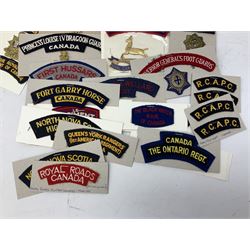Canadian metal and cloth badges, including Princess Patricias Canadian Light Infantry, Ontario Regiment, 29th Waterloo Regiment, Grenadier Guards, Logistics, Combined Services, Saskatchewan Dragoons, Irish Regiment of Canada, Sakatoon Light Infantry etc