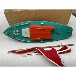 Five model boats - Sutcliffe clockwork Tiger Speedboat; boxed; Motor Sailor battery operated yacht; boxed; Waterline battery operated police launch; boxed; and Tri-ang Scalex 'Aberdeen' North Sea Drifter; boxed, with another similar unboxed (5)