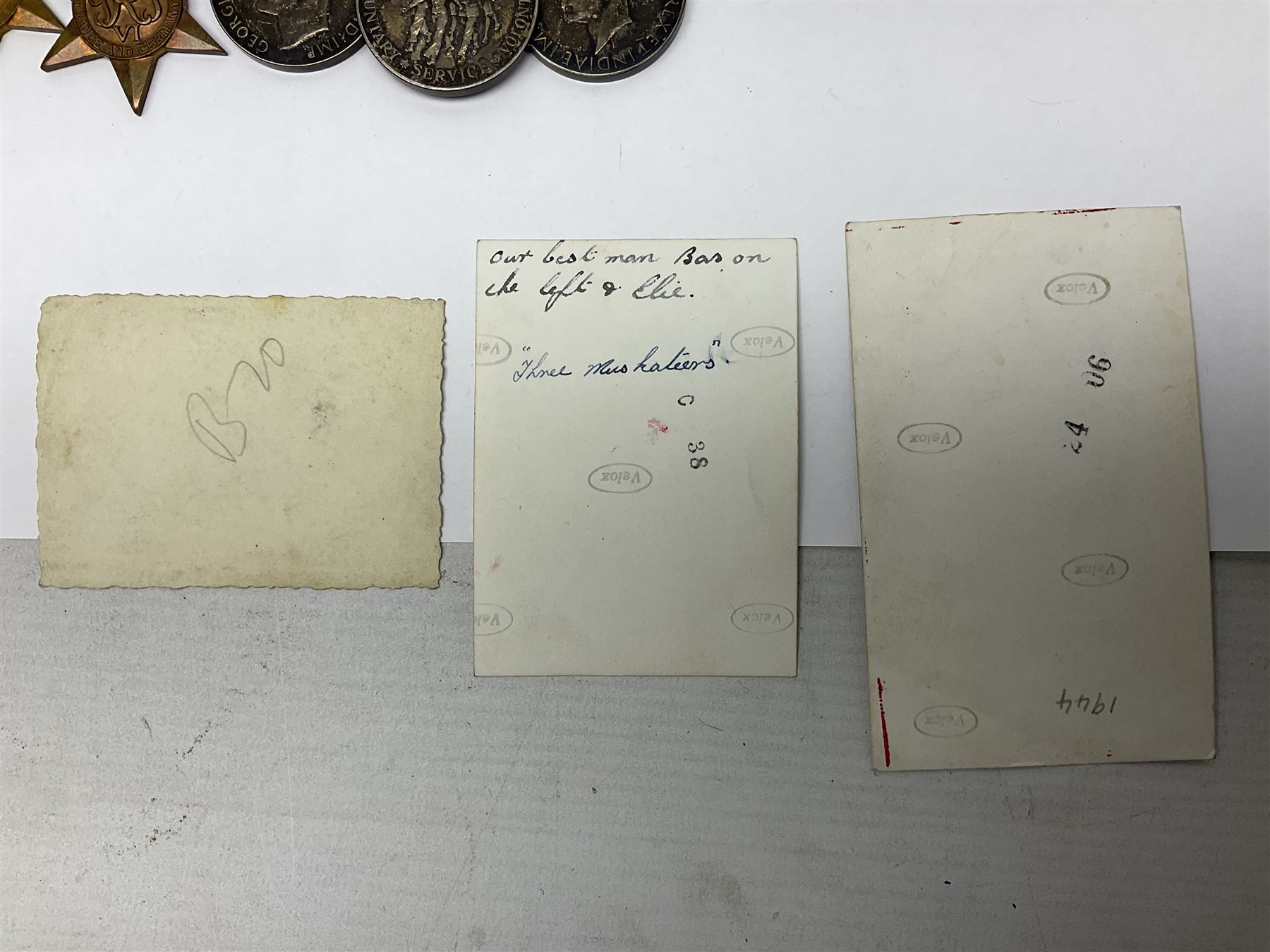 WW2 group of five medals comprising 1939-1945 War Medal, Defence Medal, 1939-1945 Star, France and Germany Star and Canadian Volunteer Service Medal; on wearing bar with ribbons; with a medal box and slip and three photographs