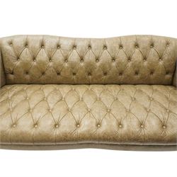 Tetrad - 'Matisse' grande three-seat sofa, Chesterfield shape with rolled arms flanking a serpentine back and front, upholstered in buttoned tan leather with close-nailed studwork, on turned feet
