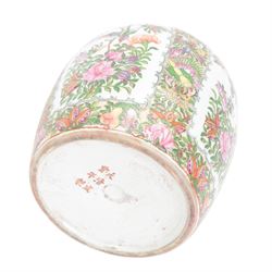 Two Canton famille rose ginger jars and covers, one decorated with birds in blossoming branches, the other with figures in a temple, together with one other jar, H30cm