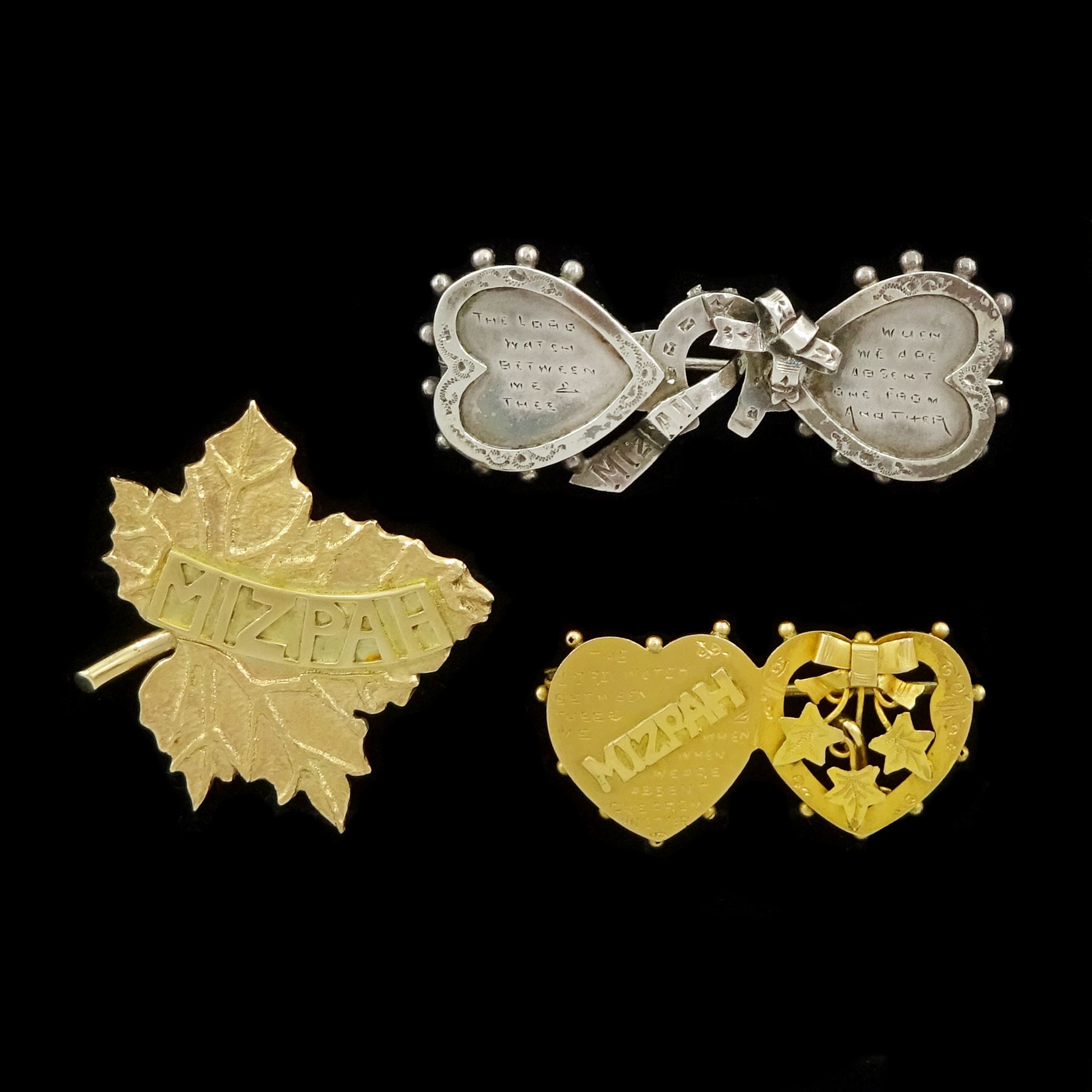 Three Mizpah brooches including gold leaf design, gold double heart and ivy leaf, both 9ct and a silver double heart, ribbon and horseshoe