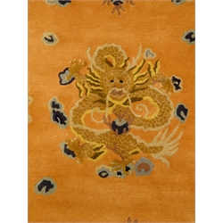  Chinese pink and blue ground wool rug, field of dragons, repeating border, 274cm x 183cm  