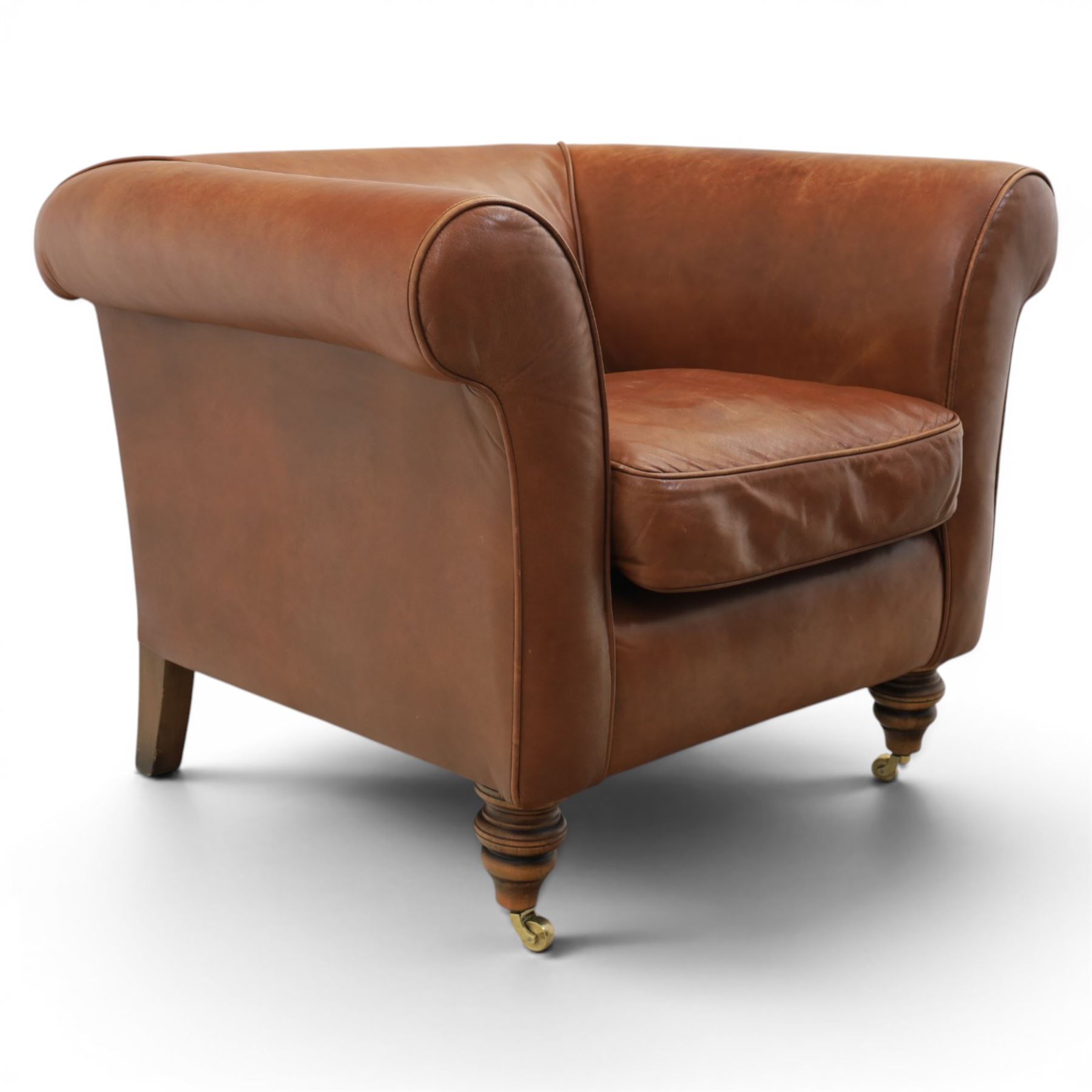 20th century tub armchair upholstered in tan leather