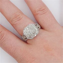 9ct white gold round brilliant cut diamond cluster ring, with diamond set shoulders, London 2015