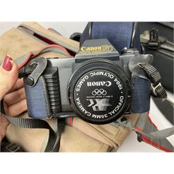 Canon T50 camera body, together with lenses and other camera equipment, projector etc