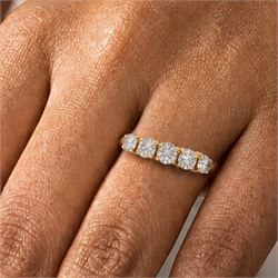 18ct gold diamond ring, set with five graduating round brilliant cut diamonds, London 2015, total diamond weight 1.21 carat